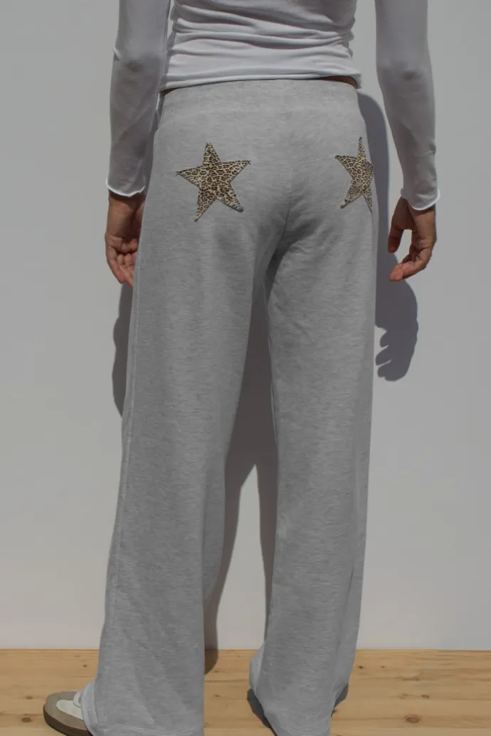 pantalone_tuta_wideleg_con_stelle_patch_2.webp Donna Subdued Pantalone tuta wide-leg con stelle patch
